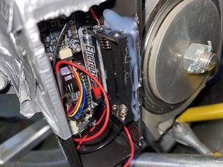 Prototype installed on car, electronics visible