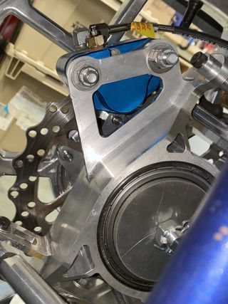 The brake caliper tab